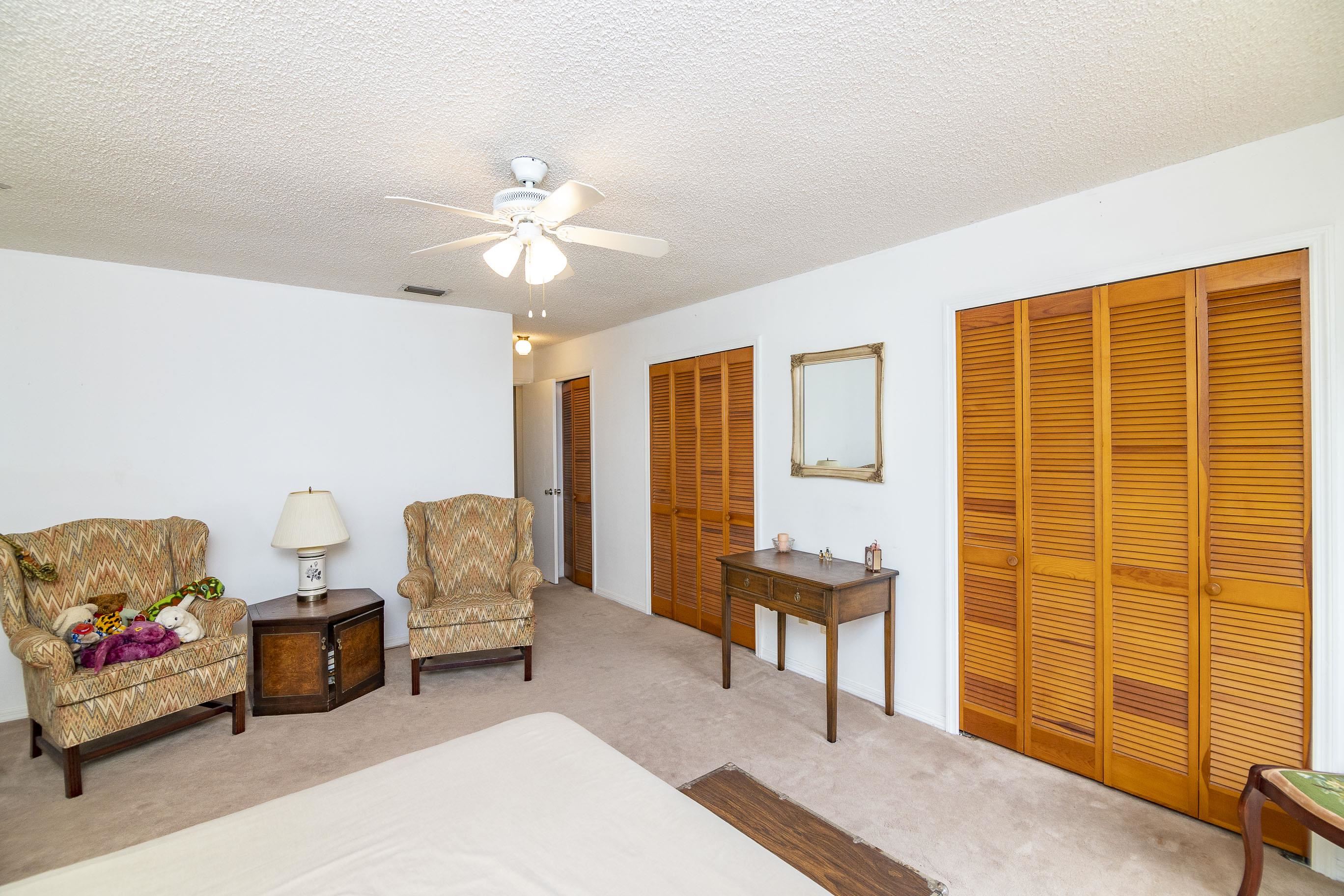 303 Cypress Road St. Augustine, FL 32086 - Photo 30 of 33 a living room with furniture and a window