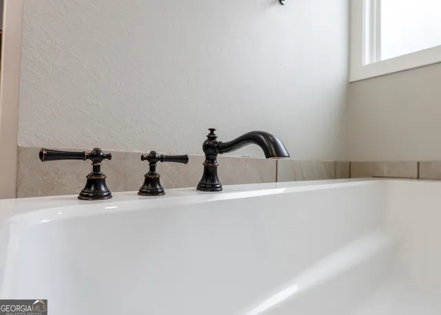 a utility room with washer and dryer