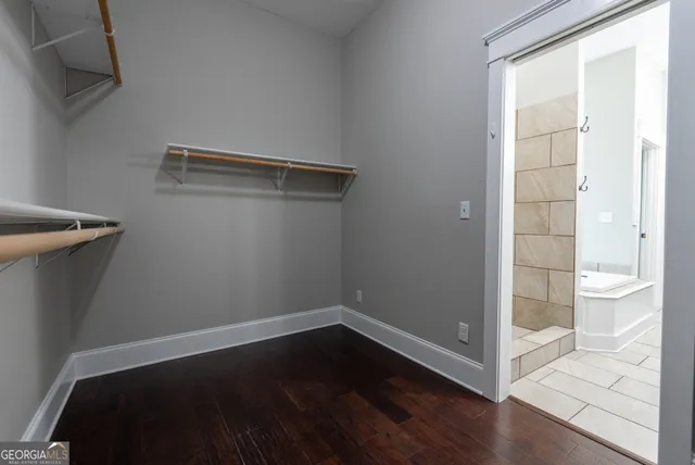 a view of a room with racks on the wall