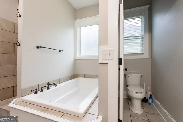 a bathroom with a sink and a shower