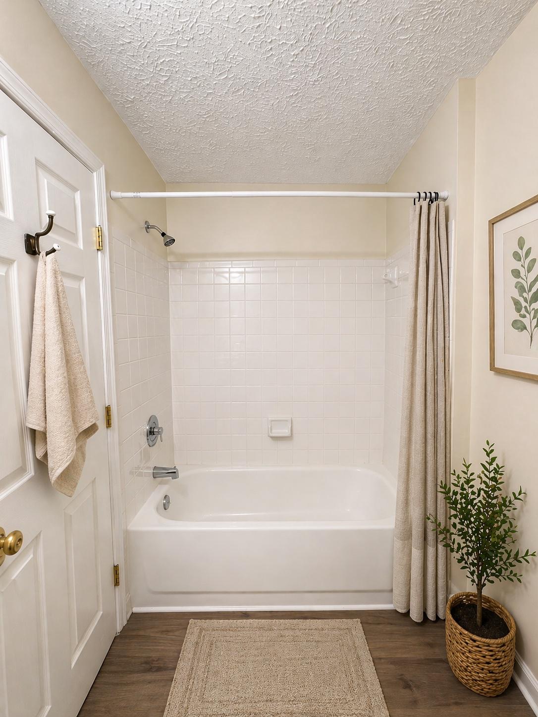 703 Orchard Overlook, Unit 301 Odenton, MD 21113 - Photo 20 of 28 Hall Bathtub Area (Virtually Staged)