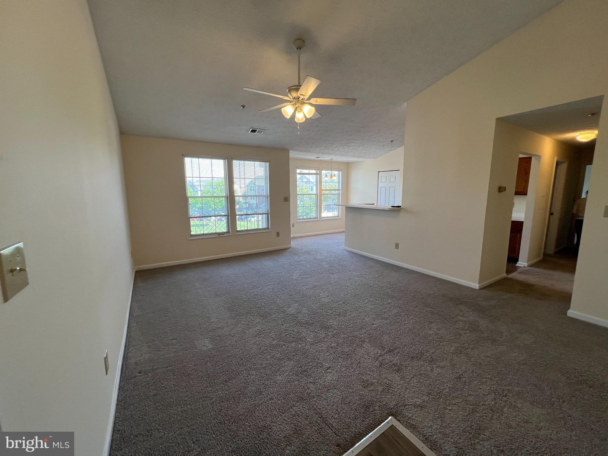 703 Orchard Overlook, Unit 301 Odenton, MD 21113 - Photo 2 of 28 Spacious living area with natural light.