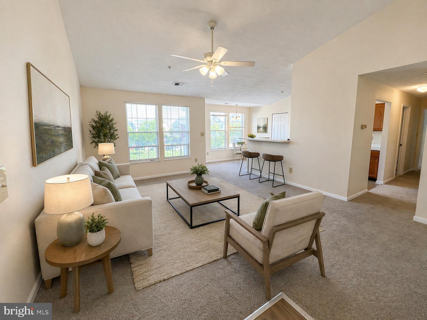 703 Orchard Overlook, Unit 301 Odenton, MD 21113 - Photo 3 of 28 Bright and airy living space awaits you.
