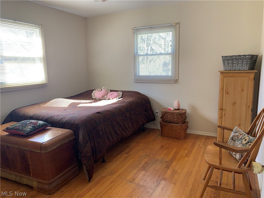 4789 West Bath Road Akron, OH 44333 - Photo 17 of 27 Bedroom with wood floors.