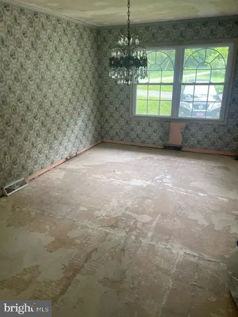 en empty room with windows