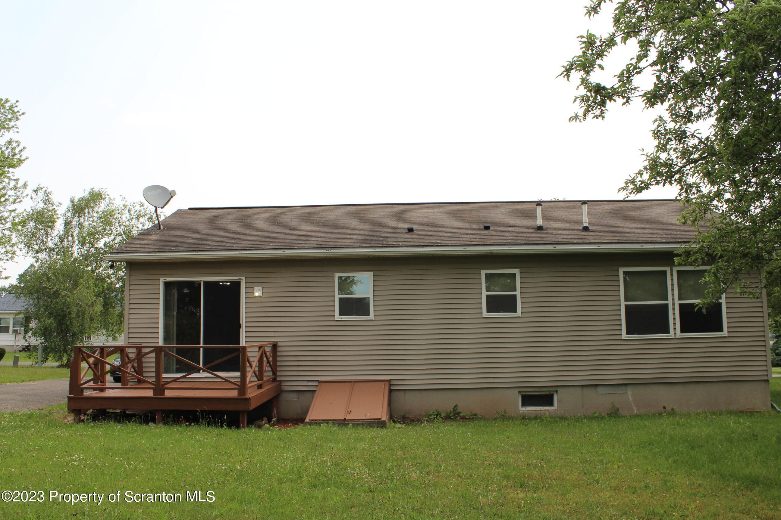 15 Jeanne Drive Tunkhannock, PA 18657 - Photo 17 of 17 a backyard of a house with a table and chairs