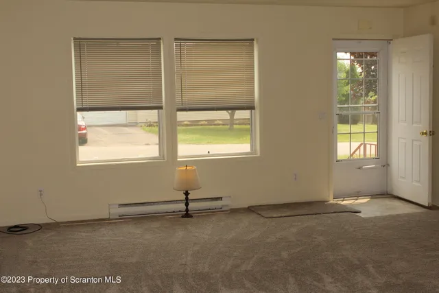 an empty room with windows