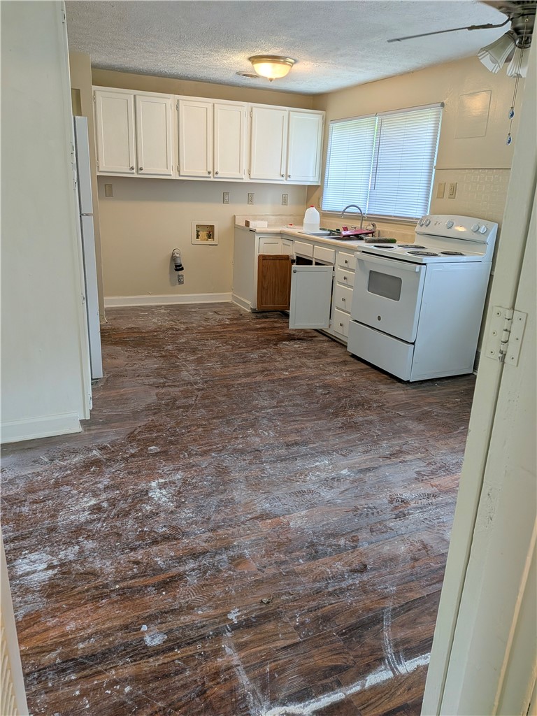 840 Brookfield Road Kettering, OH 45429 - Photo 11 of 13 This spacious kitchen offers a functional layout with ample cabinet space, ready for your personal touch.