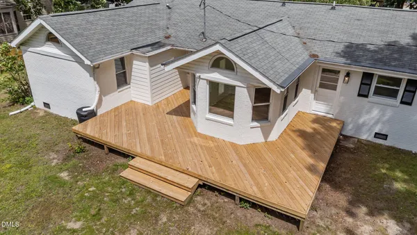 an aerial view of a house with roof