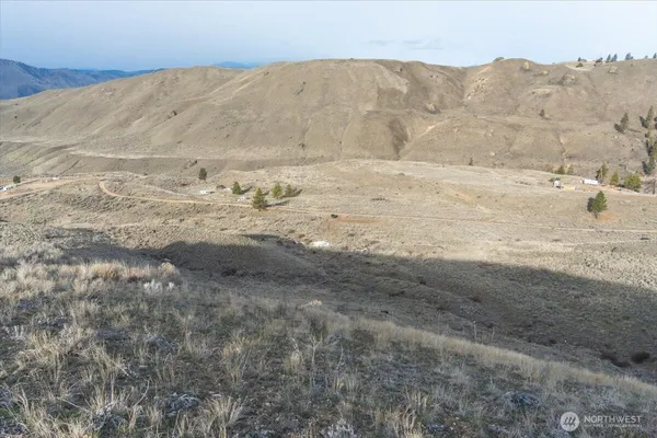 a view of mountain view with mountains in the background