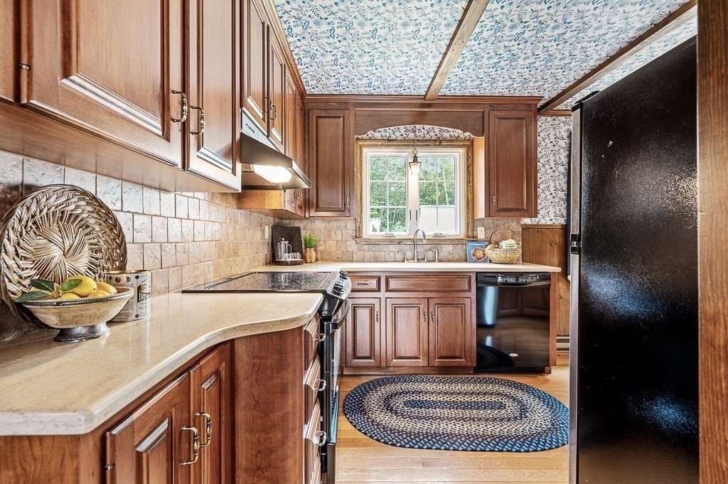 380 Quaker Street Northbridge, MA 01534 - Photo 11 of 42 a kitchen with a sink cabinets and window