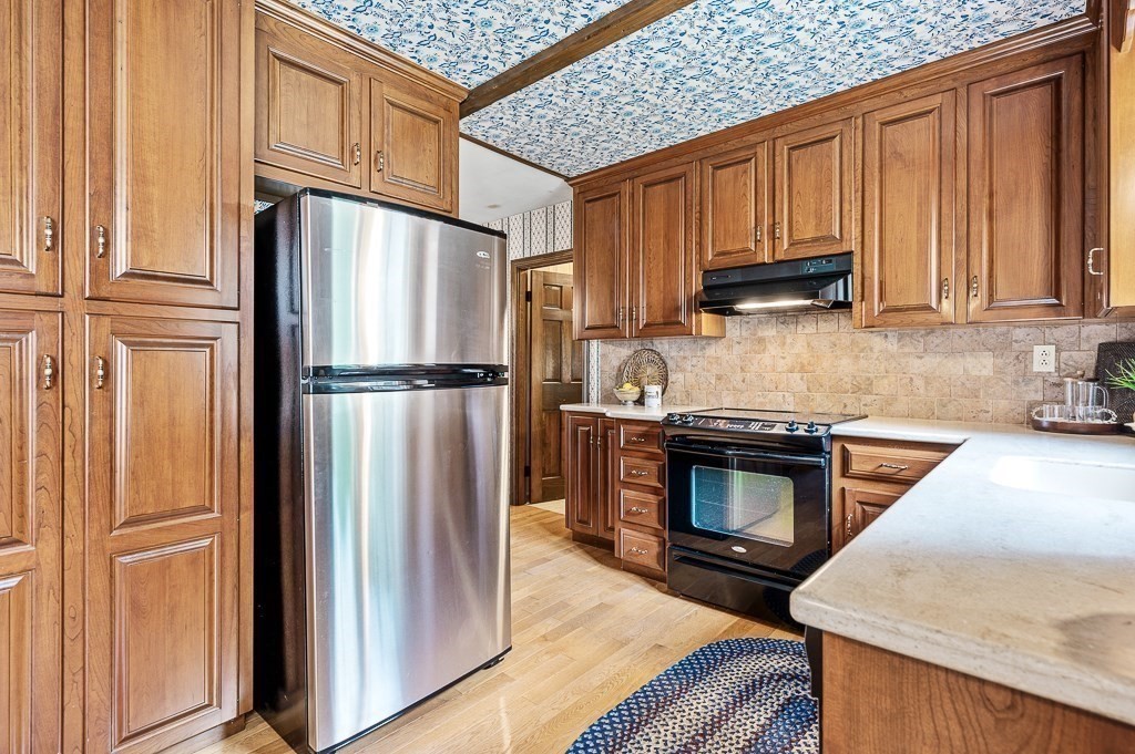 380 Quaker Street Northbridge, MA 01534 - Photo 13 of 42 a kitchen with stainless steel appliances granite countertop a refrigerator stove top oven and sink