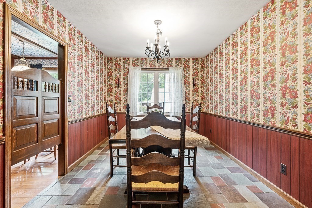 380 Quaker Street Northbridge, MA 01534 - Photo 17 of 42 a view of a dining room with furniture and chandelier