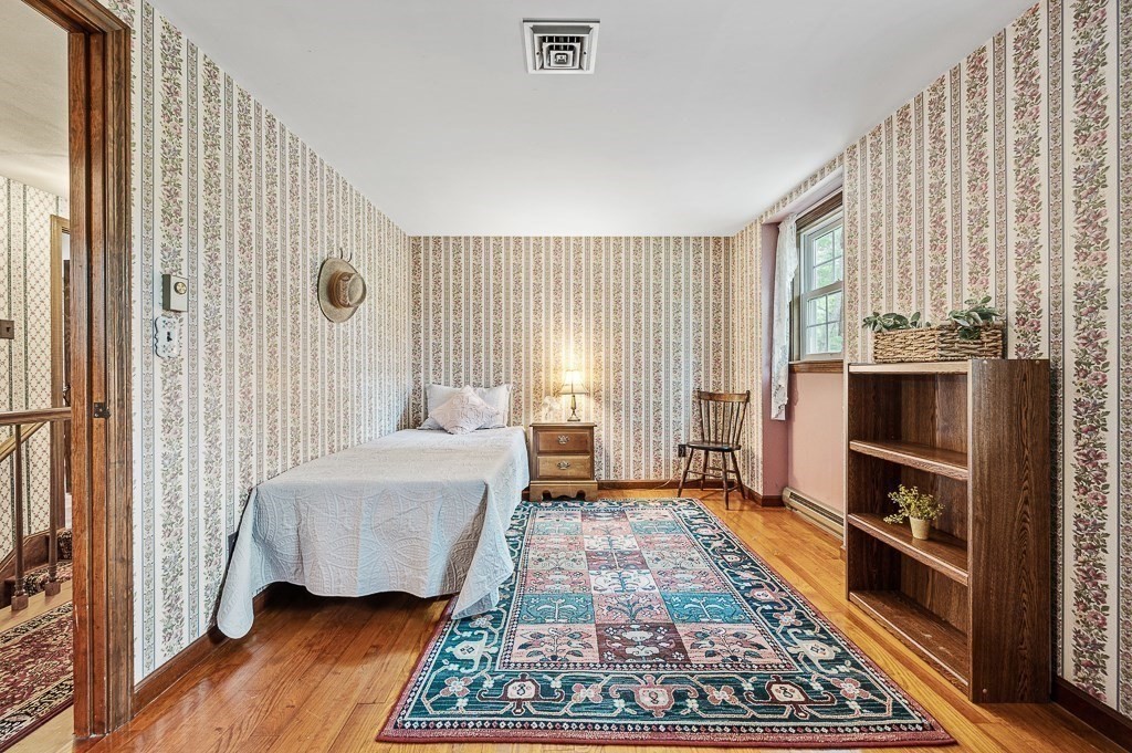 380 Quaker Street Northbridge, MA 01534 - Photo 26 of 42 a living room with furniture and a rug