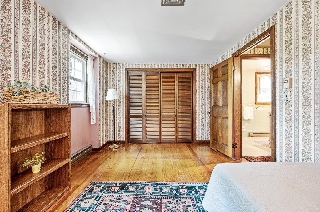 380 Quaker Street Northbridge, MA 01534 - Photo 27 of 42 a bedroom with a bed and a window