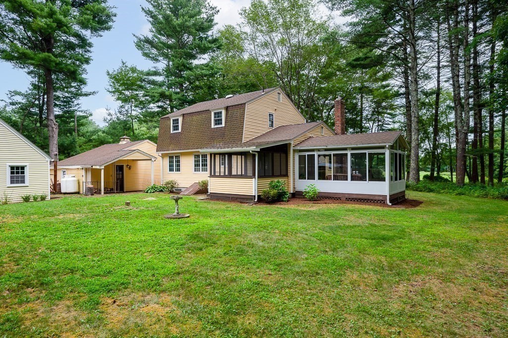 380 Quaker Street Northbridge, MA 01534 - Photo 33 of 42 a front view of a house with a garden