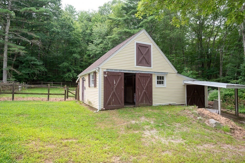 380 Quaker Street Northbridge, MA 01534 - Photo 40 of 42 a view of a house with a yard