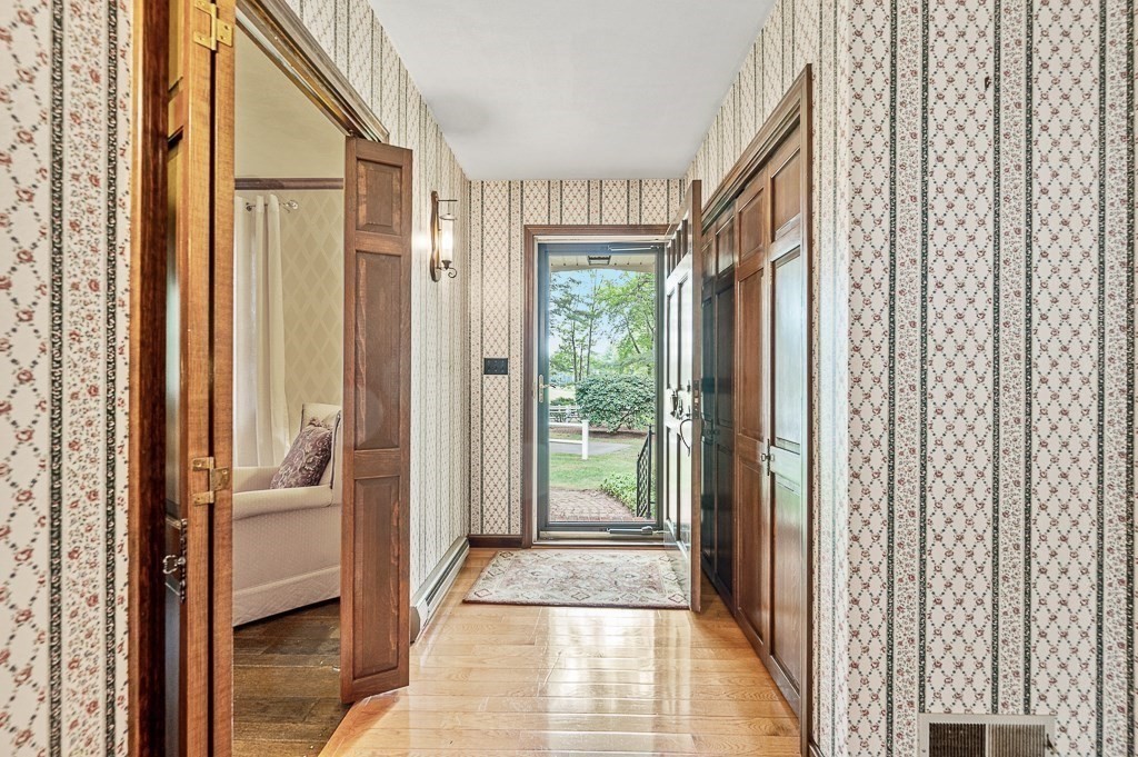 380 Quaker Street Northbridge, MA 01534 - Photo 5 of 42 a view of a hallway with windows