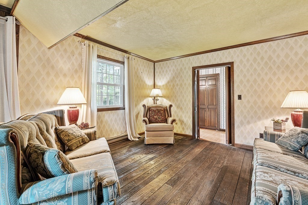 380 Quaker Street Northbridge, MA 01534 - Photo 6 of 42 a living room with furniture and a large window