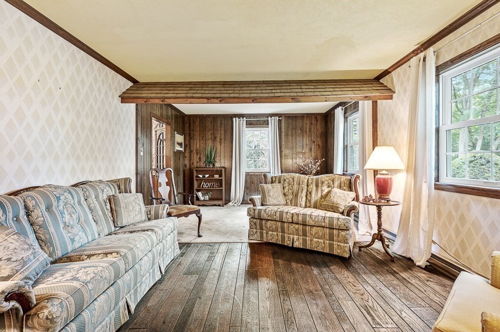 380 Quaker Street Northbridge, MA 01534 - Photo 7 of 42 a living room with furniture and a large window