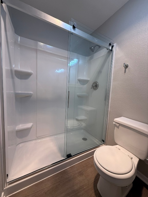 1606 Waterloo Trail, Unit A Austin, TX 78704 - Photo 13 of 17 a bathroom with a shower and a toilet