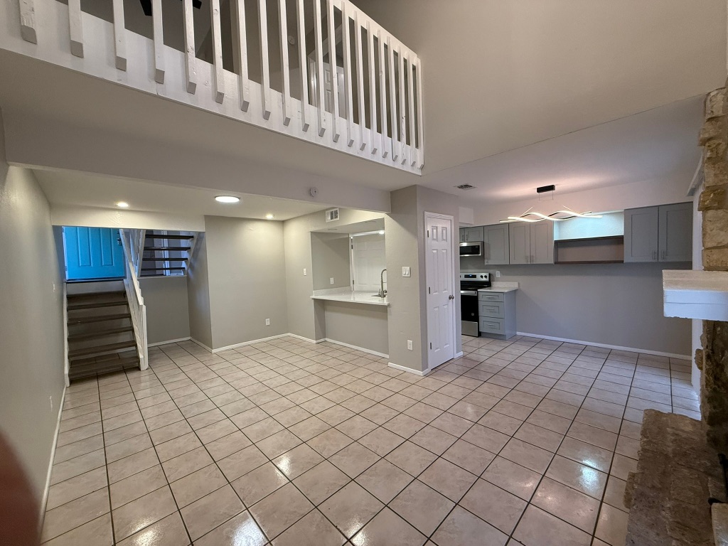 1606 Waterloo Trail, Unit A Austin, TX 78704 - Photo 5 of 17 a view of kitchen with refrigerator and cabinets