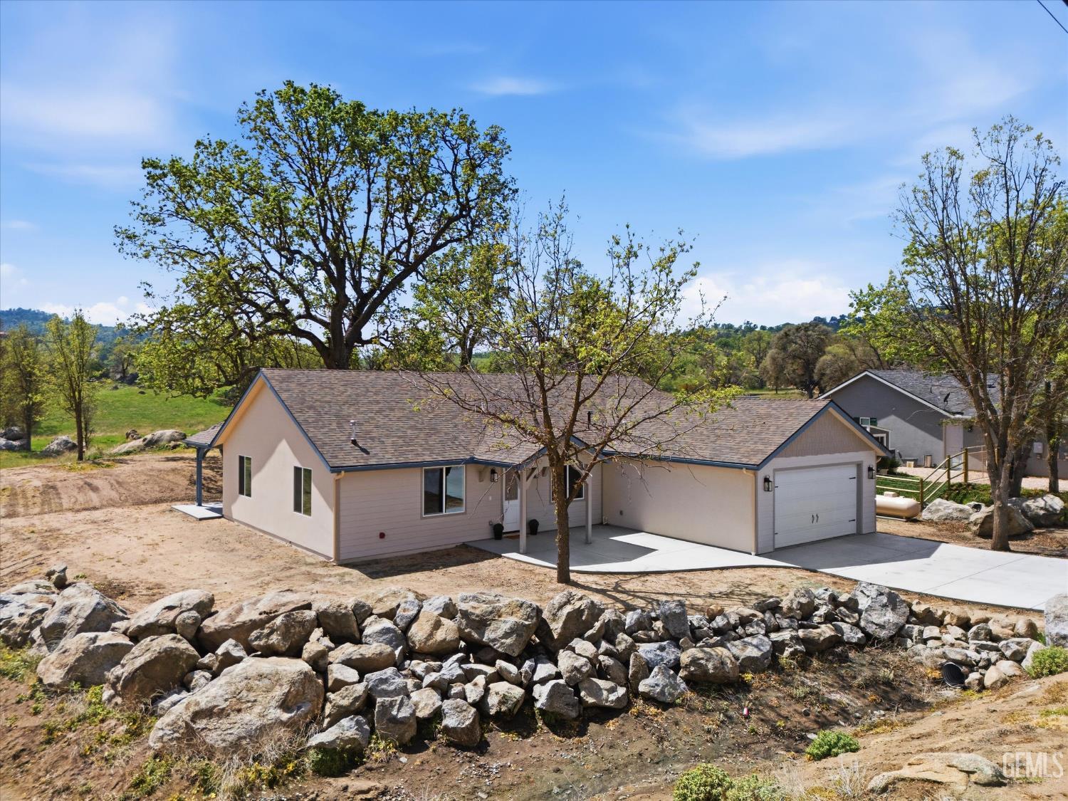 Undisclosed Address Tehachapi, CA 93561 - Photo 4 of 47 a front view of a house with a yard