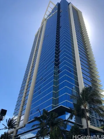 a kitchen with stainless steel appliances granite countertop a sink a stove top oven a counter space and cabinets