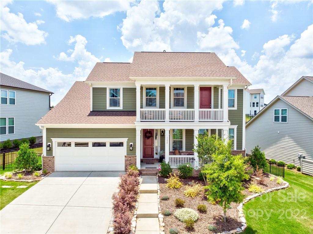 1198 Therns Ferry Drive Fort Mill, SC 29708 - Photo 1 of 48 a front view of a house with a yard