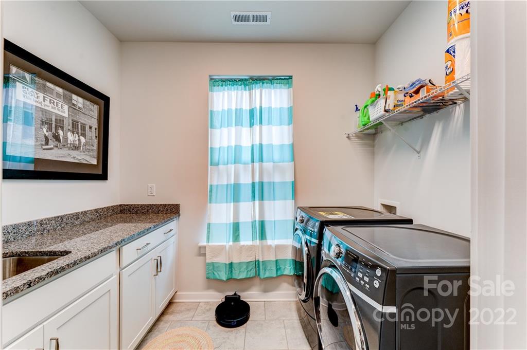 1198 Therns Ferry Drive Fort Mill, SC 29708 - Photo 18 of 48 a utility room with dryer and washer