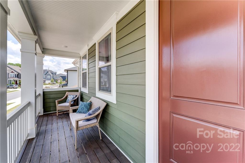 1198 Therns Ferry Drive Fort Mill, SC 29708 - Photo 25 of 48 a balcony with chairs and wooden floor