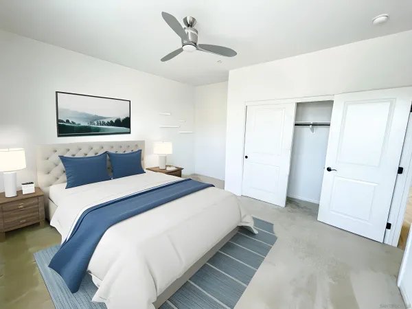 a bedroom with bed and window