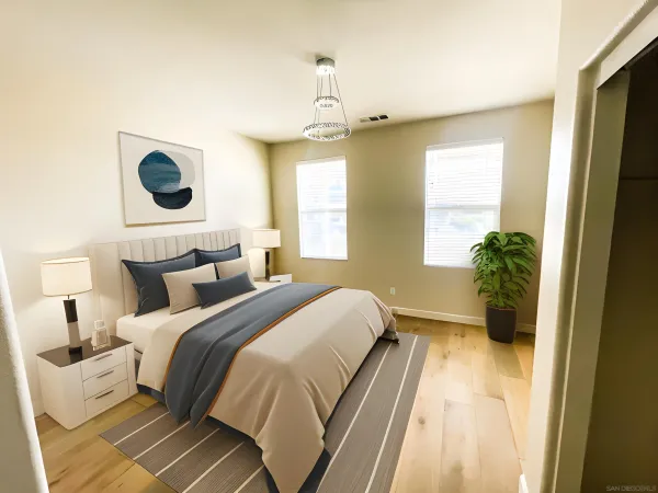 a bedroom with bed and window