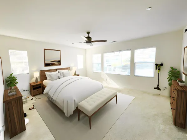 a spacious bedroom with a bed and a chandelier