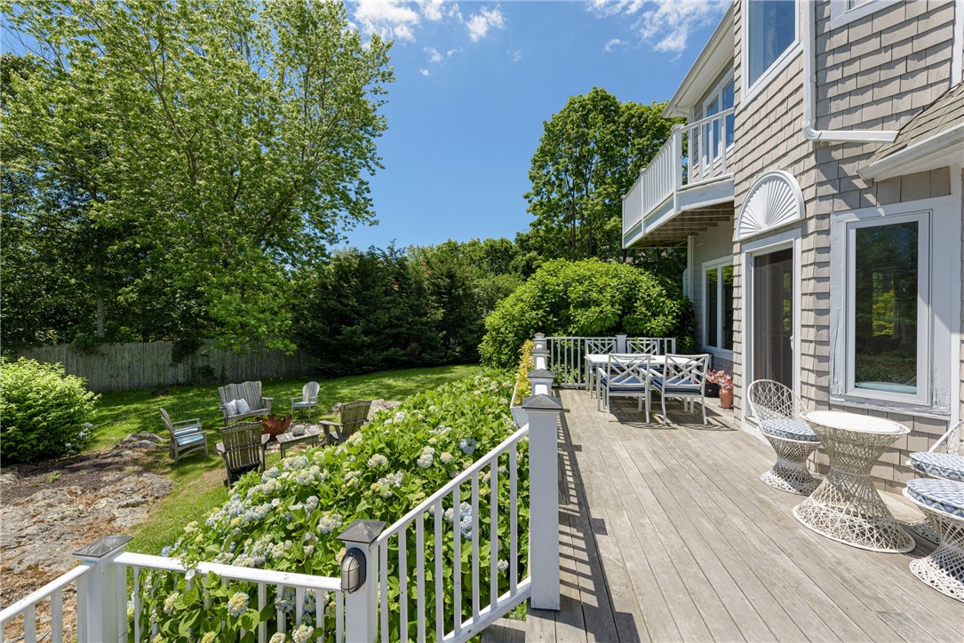 39 Brenton Road Newport, RI 02840 - Photo 2 of 40 Mature landscaping & Sunny deck - fire pit and seating below