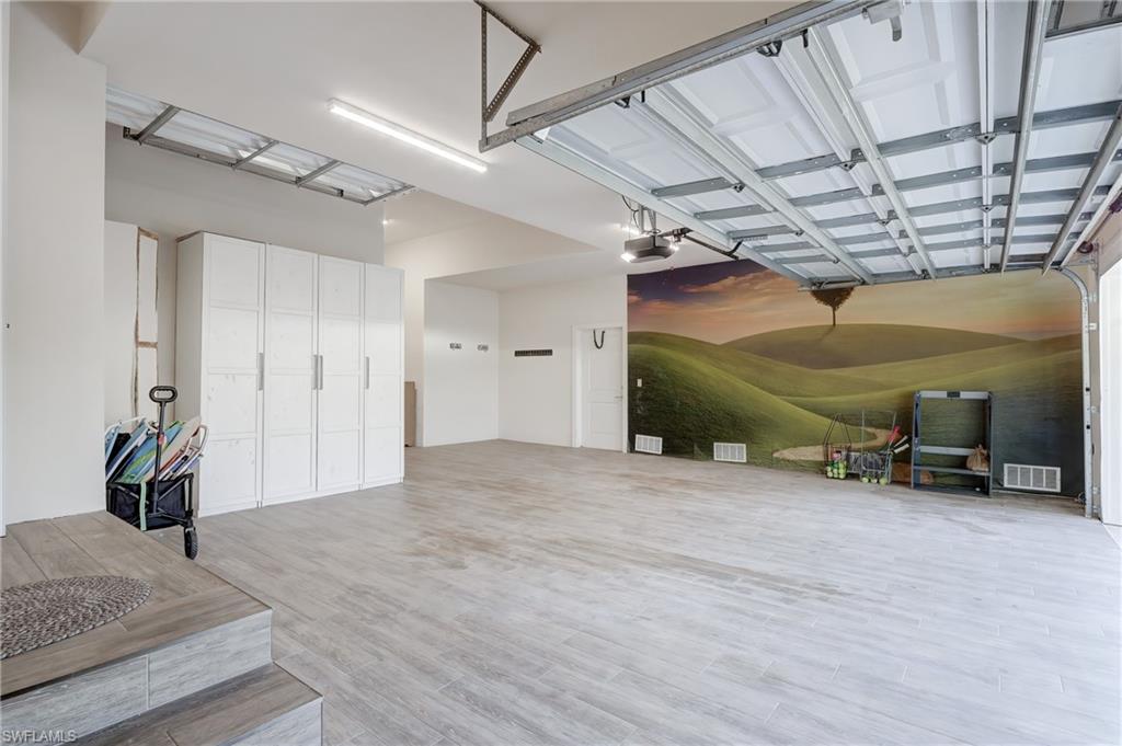 687 9th Avenue South Naples, FL 34102 - Photo 36 of 39 a view of empty room with air conditioner and ceiling fan