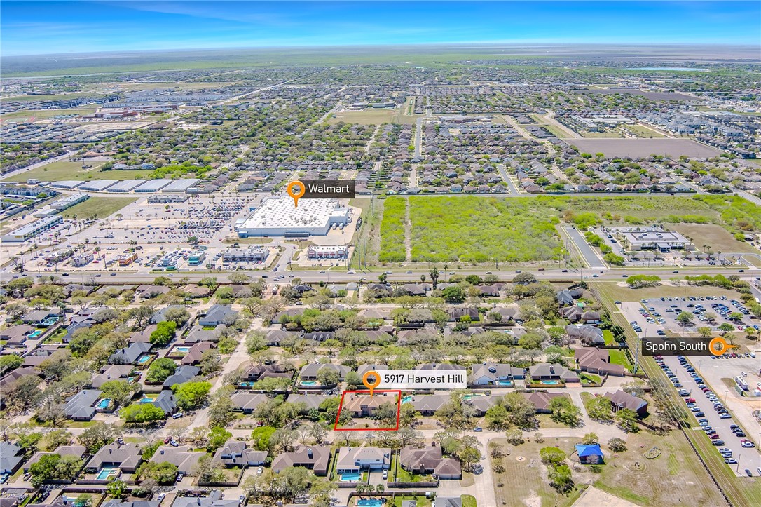 5917 Harvest Hill Road Corpus Christi, TX 78414 - Photo 39 of 40 an aerial view of residential building and ocean