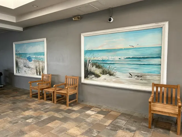 a room with table and chairs