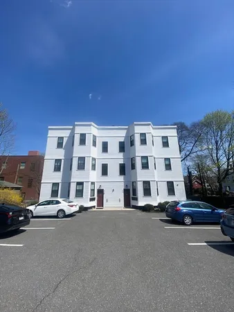 a car parked in front of a building