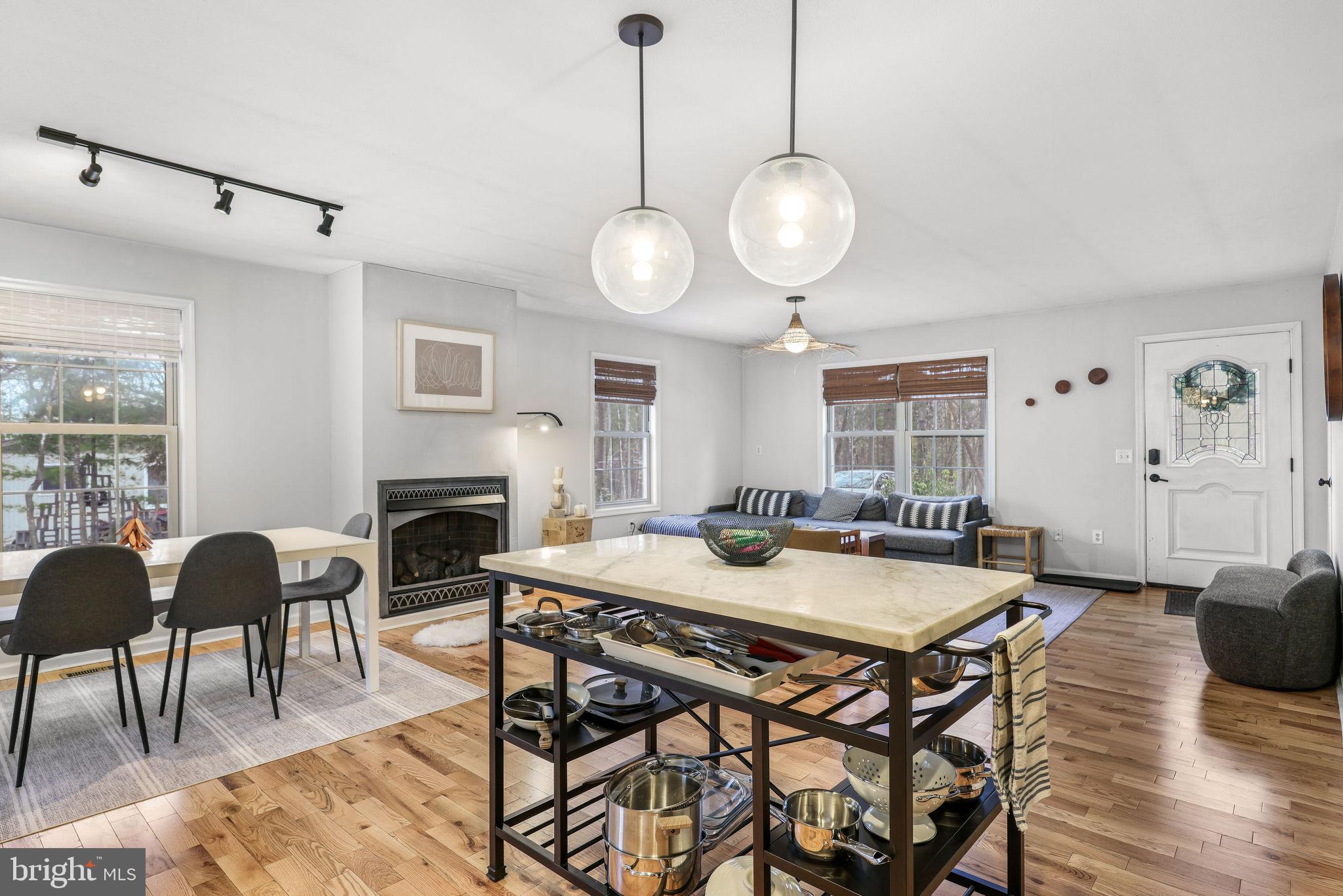 323 Palmer Road Basye, VA 22810 - Photo 2 of 30 a view of a dining room with furniture window and wooden floor