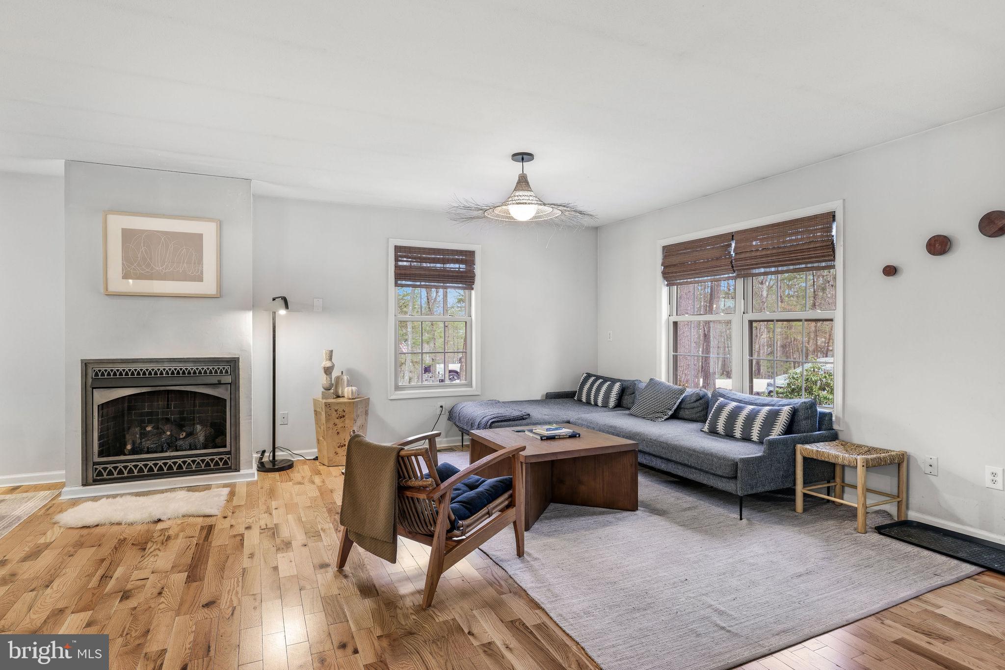 323 Palmer Road Basye, VA 22810 - Photo 24 of 30 a living room with furniture and a fireplace