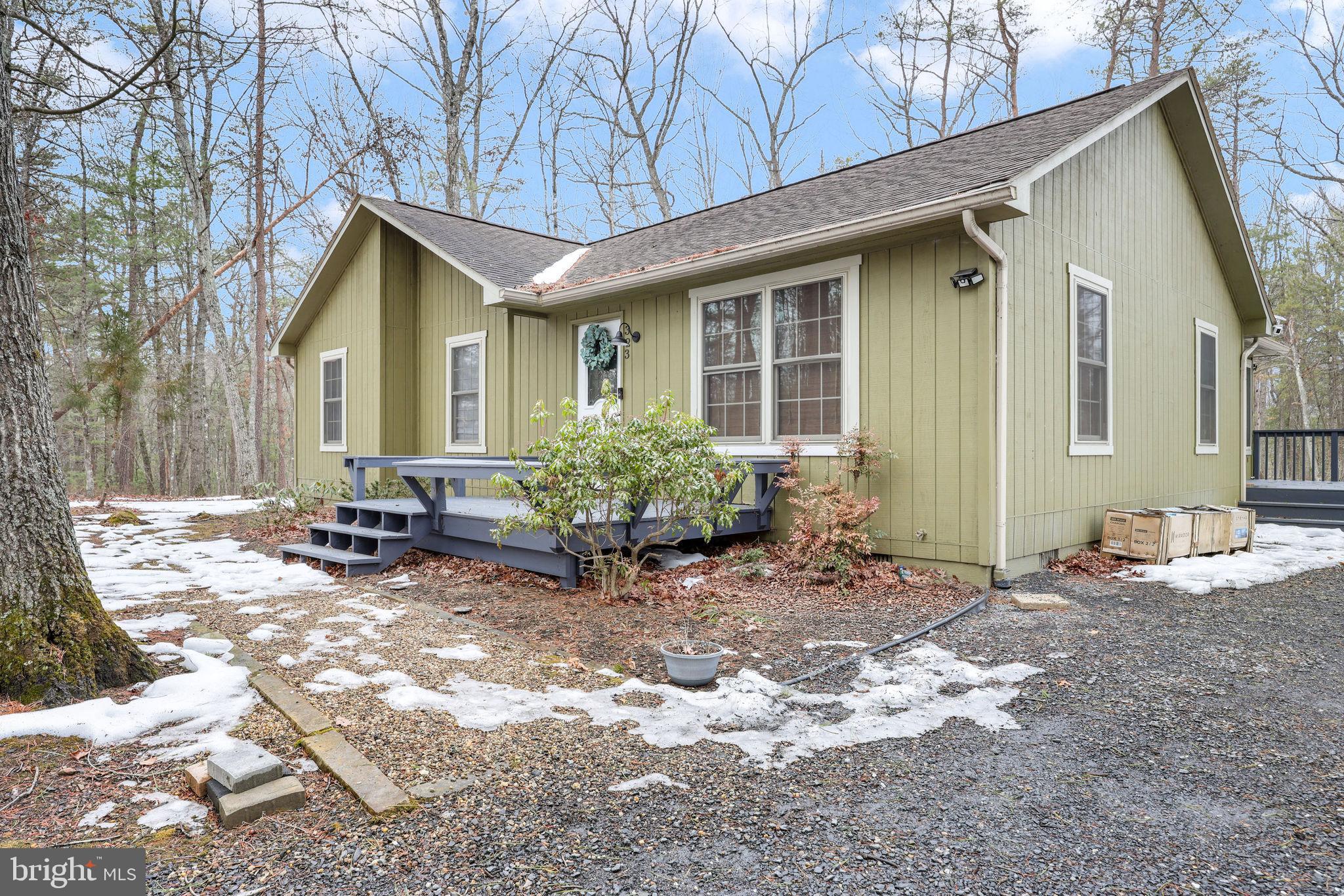 323 Palmer Road Basye, VA 22810 - Photo 6 of 30 a view of a house with yard and sitting area