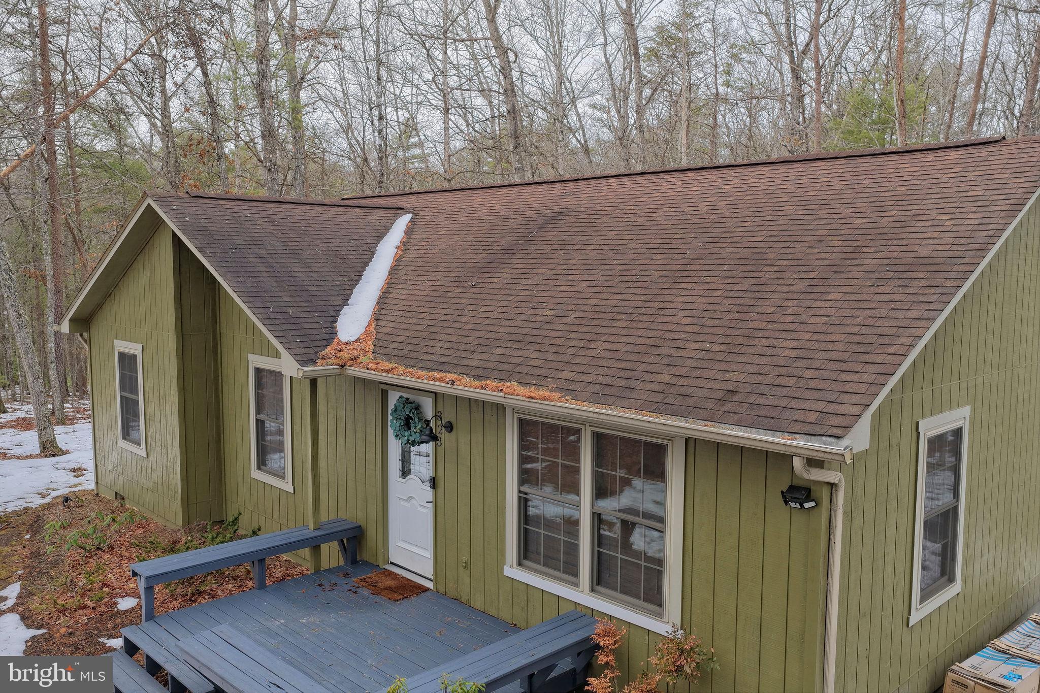 323 Palmer Road Basye, VA 22810 - Photo 9 of 30 a backyard of a house