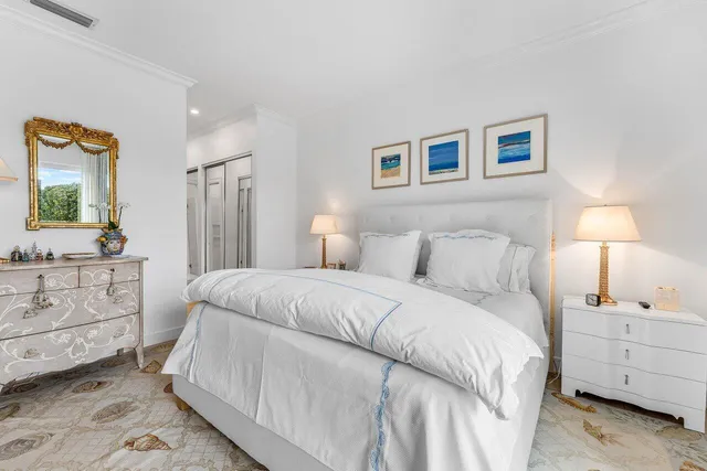 a bathroom with a shower and a glass door