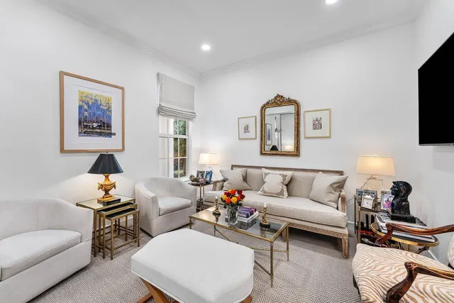 a kitchen with stainless steel appliances granite countertop a sink stove and white cabinets