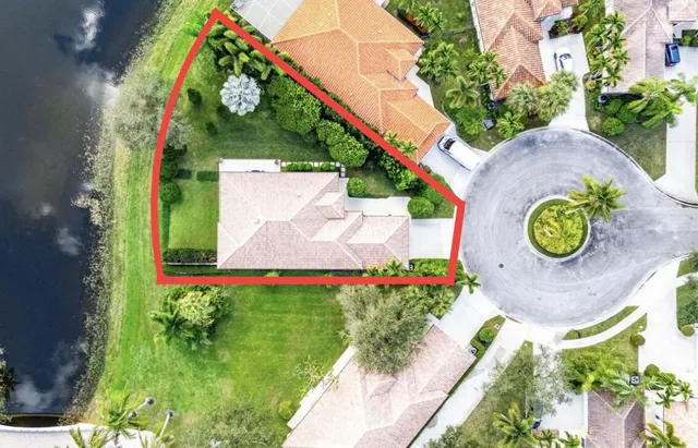 a living room with furniture wooden floor and a chandelier