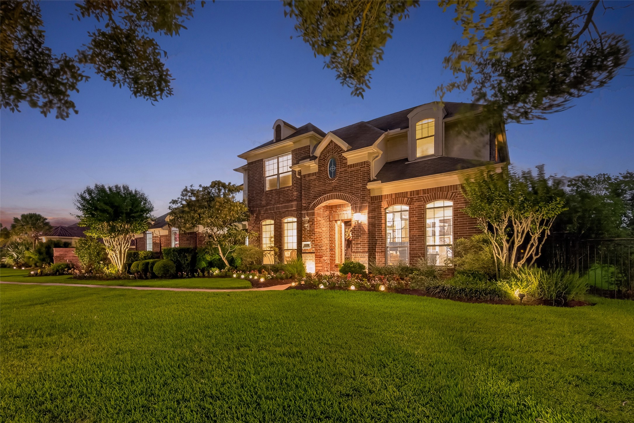 2319 Braer Ridge Drive Katy, TX 77494 - Photo 47 of 50 a front view of a house with a yard