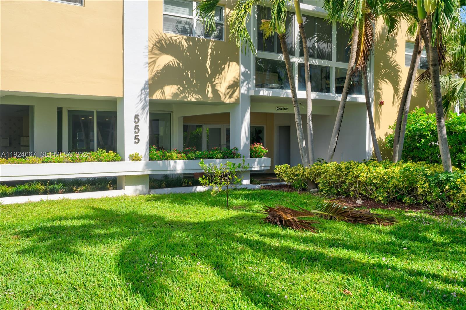 555 Crandon Boulevard, Unit 21 Key Biscayne, FL 33149 - Photo 26 of 32 a view of a house with a swimming pool