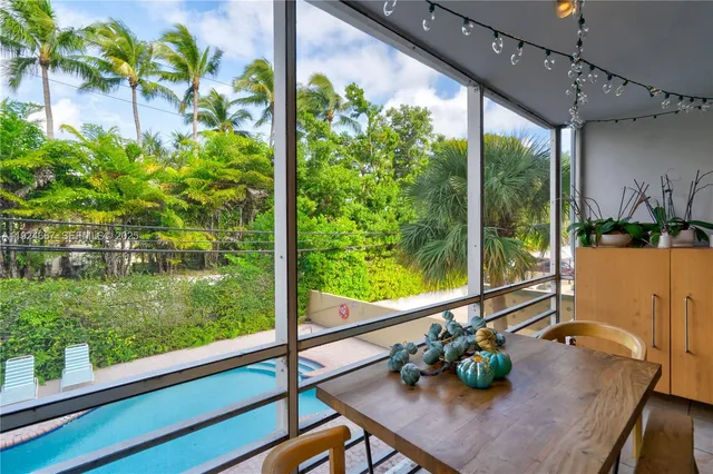 a view from deck with patio