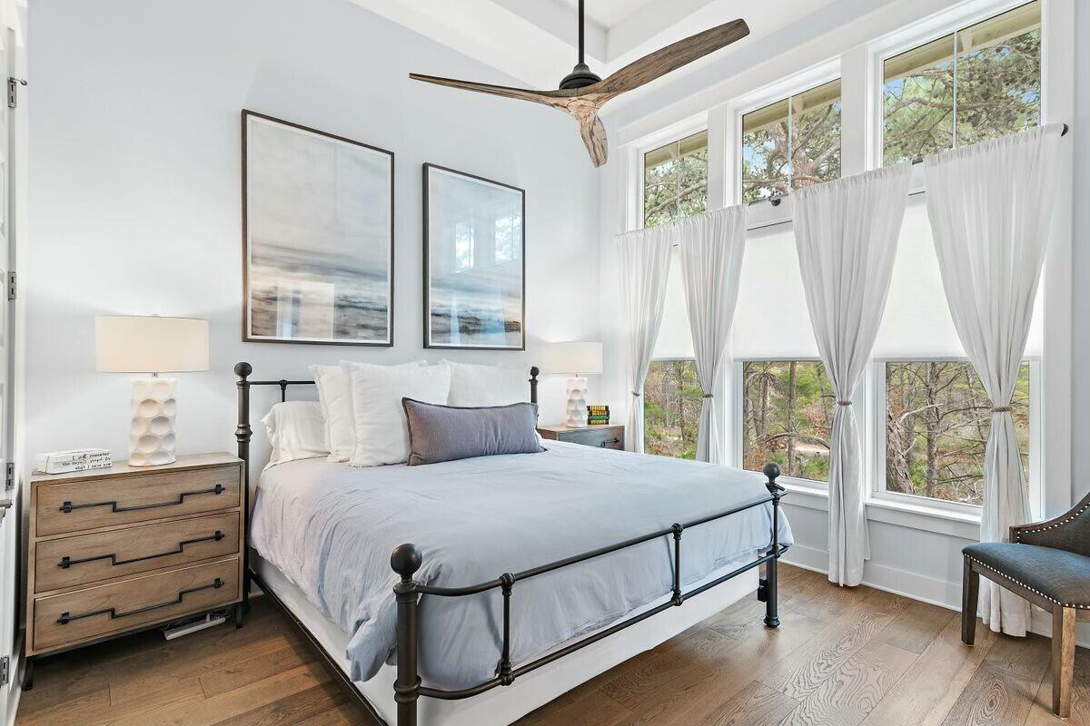 58 East Milestone Dr Inlet Beach, Unit B Inlet Beach, FL 32461 - Photo 17 of 47 a bedroom with a bed and a window